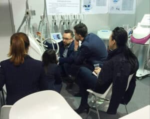A group of people looking at Beauty Equipment at Cosmoprof Bologna 2016.