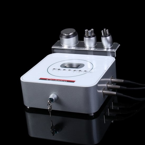 Pieni Best Anti Cellulite Kavitation Rf Radio Frequency Home Device Hoito, johon on kiinnitetty kaksi johtoa, jossa hyödynnetään Radio Frequency (RF) -tekniikkaa selluliittihoitoon.