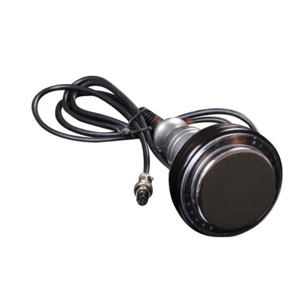 A black button with a wire attached to it, commonly used in Beauty Equipment Suppliers Ultrasound Cavitation / Kavitation Lipo Weight Loss Treatment.