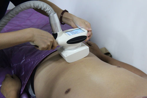 A man is receiving a laser treatment service.