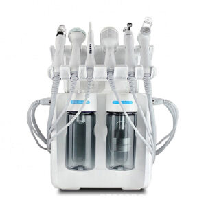 Ένα λευκό Hydrafacial Machine Best Medilight 6 σε 1 με πολλούς διαφορετικούς τύπους εξοπλισμού.